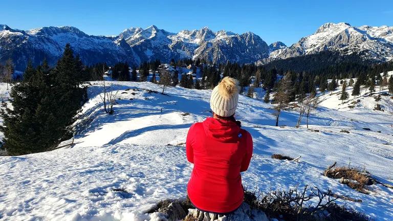 Romana Gorjanc by snow-covered mountains