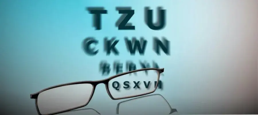 Glasses in front of alphabet 