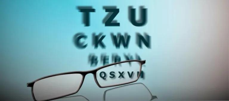Glasses in front of alphabet 