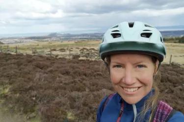 Lana Talmane wearing a cycling helmet