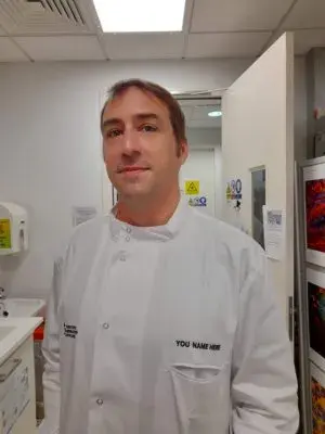 James Furniss in a lab coat